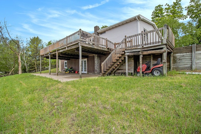 1981 E Wolf Rd, Hart, MI 49420 - rear view of property featuring a deck, french doors, a patio area, and stairway