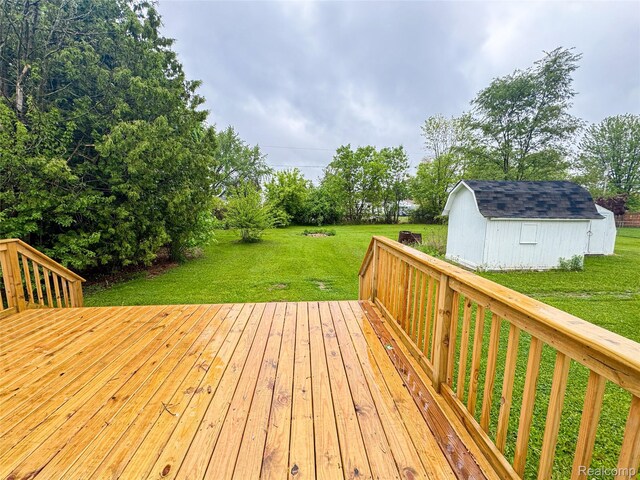 8909 E Country Ln, Lennon, MI 48449 - wooden deck featuring a lawn