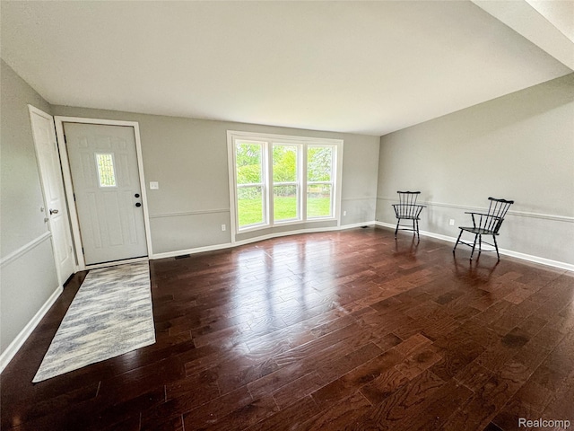8909 E Country Ln, Lennon, MI 48449 - foyer entrance featuring dark wood-style flooring and baseboards