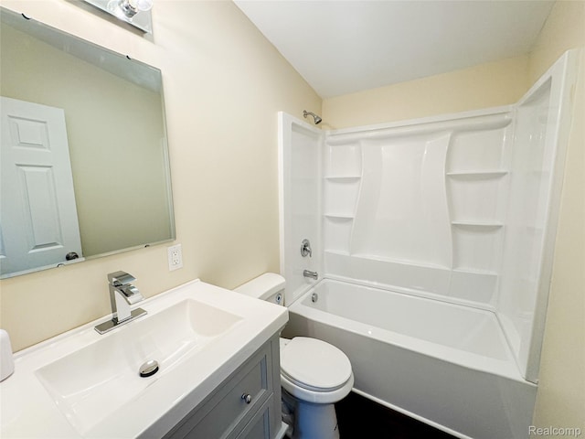 8909 E Country Ln, Lennon, MI 48449 - bathroom featuring toilet, vanity, and bathtub / shower combination