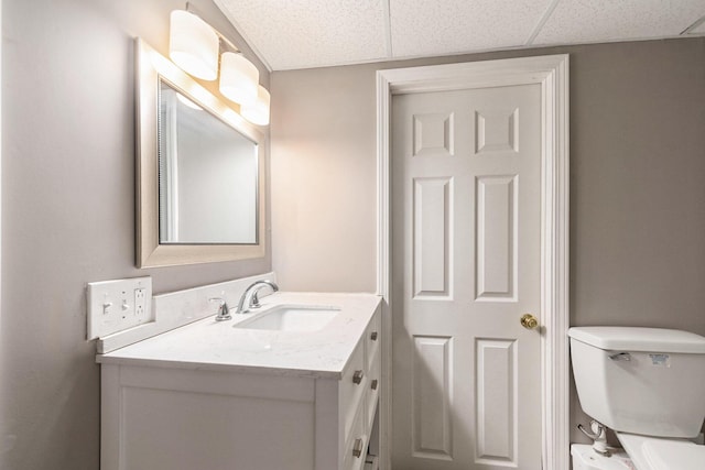 2441 Butterfly Ln, Berrien Springs, MI 49103 - bathroom with vanity, toilet, and a paneled ceiling