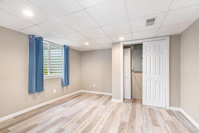 2441 Butterfly Ln, Berrien Springs, MI 49103 - unfurnished bedroom with wood finished floors, a paneled ceiling, baseboards, a closet, and recessed lighting