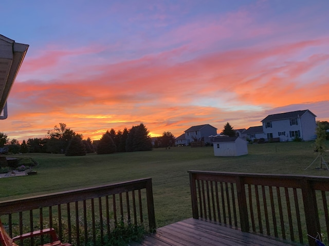2441 Butterfly Ln, Berrien Springs, MI 49103 - wooden deck featuring a lawn and a residential view