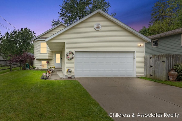 1300 Lancaster Ave NW, Grand Rapids, MI 49504 - view of front of property featuring concrete driveway and an attached garage