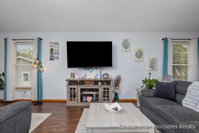 1300 Lancaster Ave NW, Grand Rapids, MI 49504 - living area with baseboards and dark wood-style floors