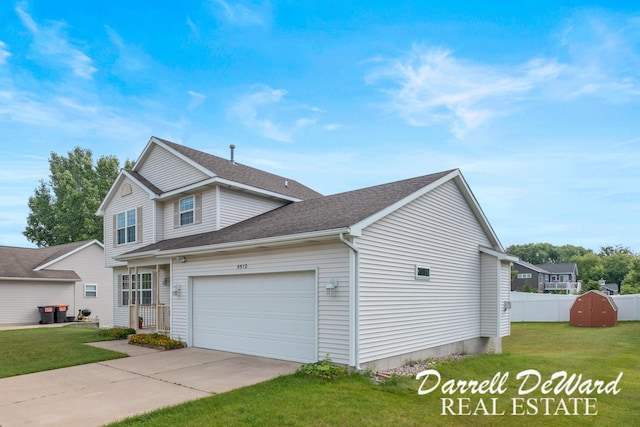 5512 Lillyview Ave SW, Wyoming, MI 49509 - view of front of house featuring a garage, driveway, and a shingled roof