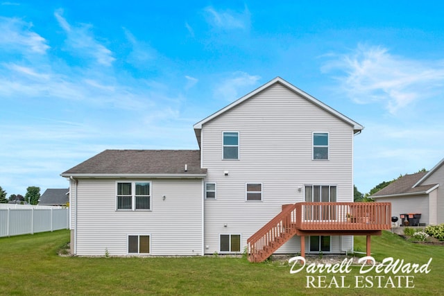 5512 Lillyview Ave SW, Wyoming, MI 49509 - back of property featuring a wooden deck, stairs, and roof with shingles