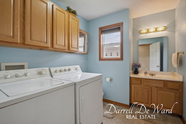 5512 Lillyview Ave SW, Wyoming, MI 49509 - washroom featuring washing machine and clothes dryer and baseboards