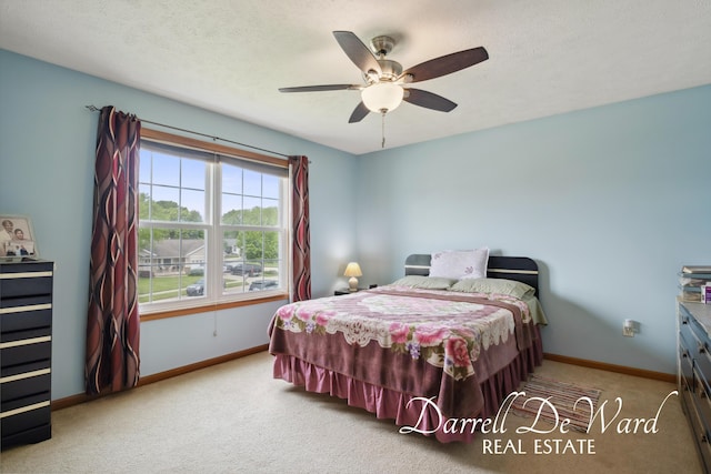 5512 Lillyview Ave SW, Wyoming, MI 49509 - bedroom featuring carpet, baseboards, ceiling fan, and a textured ceiling