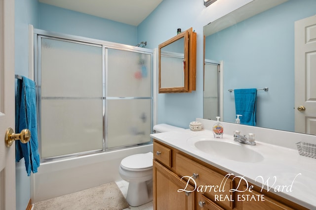 5512 Lillyview Ave SW, Wyoming, MI 49509 - full bathroom with vanity, toilet, bath / shower combo with glass door, and tile patterned flooring
