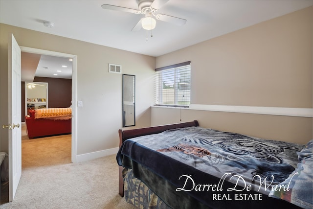 5512 Lillyview Ave SW, Wyoming, MI 49509 - bedroom featuring carpet flooring, baseboards, and a ceiling fan