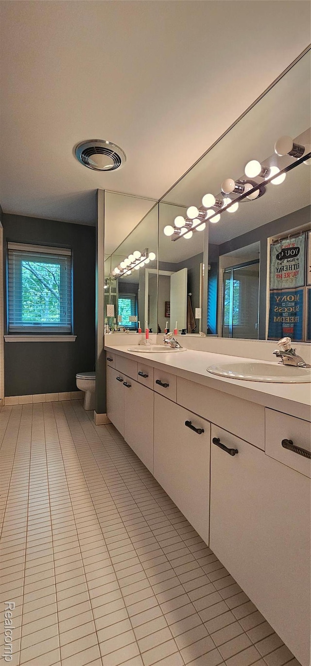 5084 Champlain Cir W, Bloomfield, MI 48323 - bathroom with tile patterned flooring, double vanity, and toilet