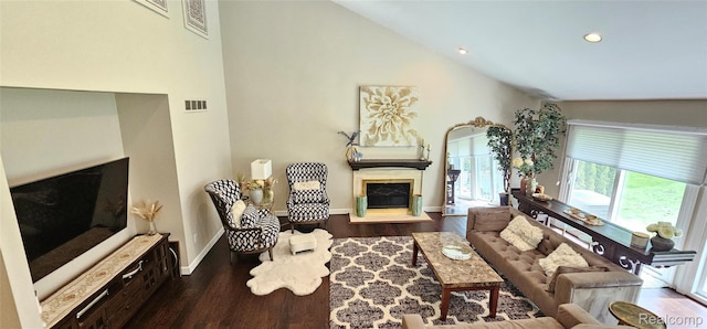 5084 Champlain Cir W, Bloomfield, MI 48323 - living room with a glass covered fireplace, wood finished floors, lofted ceiling, baseboards, and recessed lighting