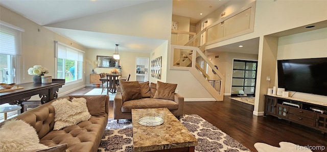5084 Champlain Cir W, Bloomfield, MI 48323 - living area featuring stairway, wood finished floors, baseboards, and a towering ceiling