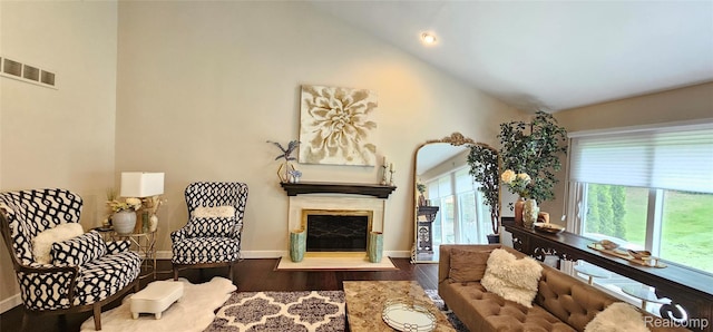 5084 Champlain Cir W, Bloomfield, MI 48323 - sitting room with a fireplace with flush hearth, wood finished floors, baseboards, high vaulted ceiling, and recessed lighting