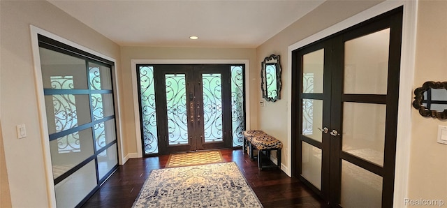 5084 Champlain Cir W, Bloomfield, MI 48323 - entryway featuring french doors, healthy amount of natural light, dark wood finished floors, recessed lighting, and baseboards