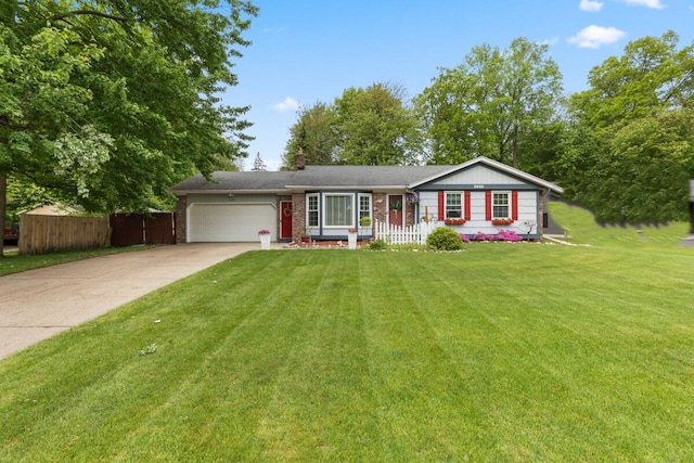 4239 Glen Hollow Dr, Hudsonville, MI 49426 - ranch-style home with a garage, concrete driveway, a chimney, and brick siding