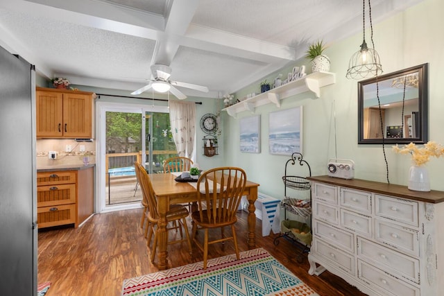 4239 Glen Hollow Dr, Hudsonville, MI 49426 - dining space featuring dark wood-style flooring, a ceiling fan, beam ceiling, and coffered ceiling