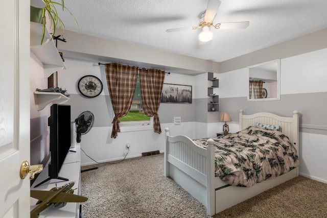 4239 Glen Hollow Dr, Hudsonville, MI 49426 - bedroom with carpet flooring, a ceiling fan, baseboards, and a textured ceiling