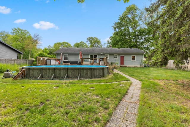 4239 Glen Hollow Dr, Hudsonville, MI 49426 - rear view of property featuring a deck