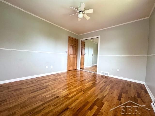 7200 Danny Dr, Saginaw, MI 48609 - spare room with ceiling fan, wood finished floors, ornamental molding, and baseboards