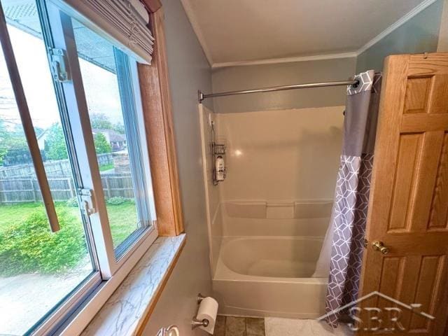 7200 Danny Dr, Saginaw, MI 48609 - full bathroom featuring crown molding, healthy amount of natural light, shower / bath combination with curtain, and tile patterned flooring