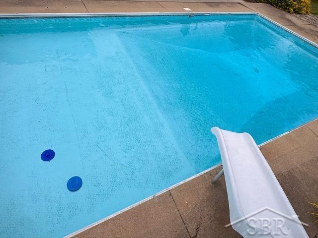 7200 Danny Dr, Saginaw, MI 48609 - outdoor pool featuring a water slide