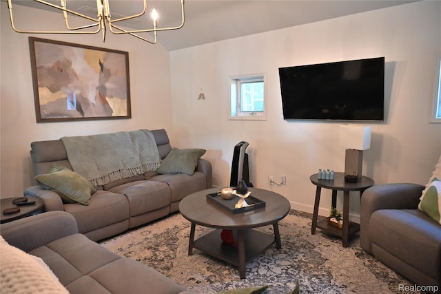 23744 Liddle St, Brownstown, MI 48183 - living room featuring a chandelier and baseboards