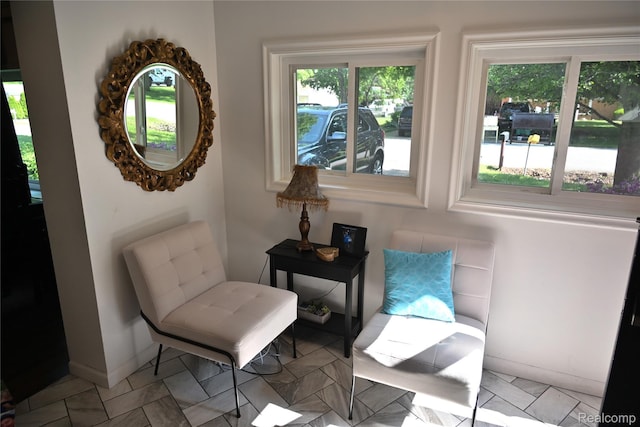 23744 Liddle St, Brownstown, MI 48183 - living area featuring plenty of natural light and baseboards