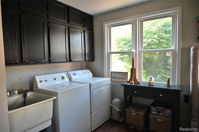 23744 Liddle St, Brownstown, MI 48183 - laundry room featuring cabinet space, washer and dryer, and dark wood-type flooring