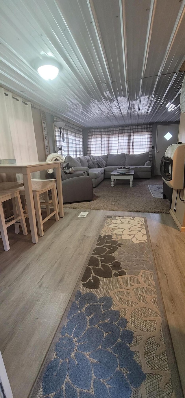 11384 N Irons Rd, Irons, MI 49644 - living room featuring wood finished floors