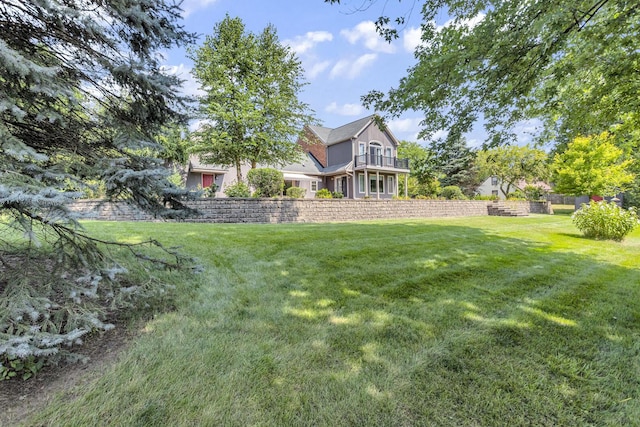 1780 Williamsburg Dr, Adrian, MI 49221 - view of grassy yard featuring a balcony