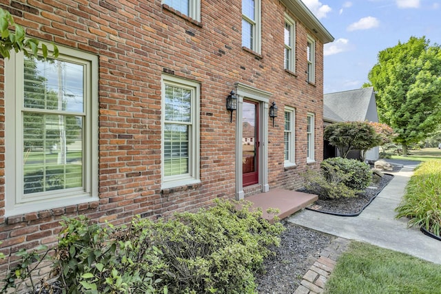 1780 Williamsburg Dr, Adrian, MI 49221 - view of exterior entry with brick siding