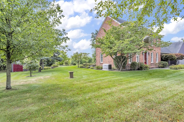 1780 Williamsburg Dr, Adrian, MI 49221 - view of grassy yard with central AC
