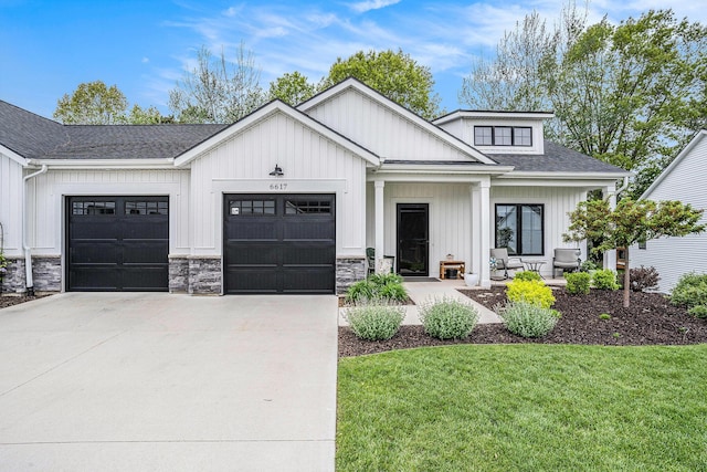 6617 Sheldon Crossing Dr, Hudsonville, MI 49426 - modern farmhouse featuring driveway, an attached garage, board and batten siding, and a front lawn