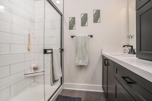 6617 Sheldon Crossing Dr, Hudsonville, MI 49426 - bathroom with vanity, baseboards, and a stall shower
