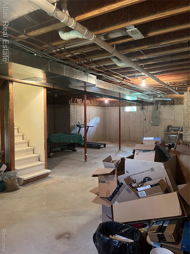 4440 Colby Ct, Burton, MI 48519 - unfinished below grade area featuring stairway