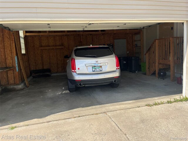 4440 Colby Ct, Burton, MI 48519 - garage with driveway