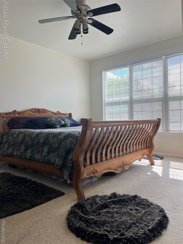 4440 Colby Ct, Burton, MI 48519 - carpeted bedroom with ceiling fan