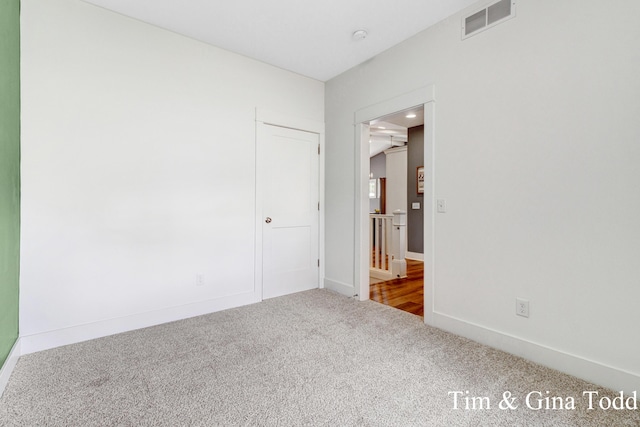 903 S Center Park Dr SW Unit 14, Byron Center, MI 49315 - unfurnished bedroom with carpet flooring and baseboards