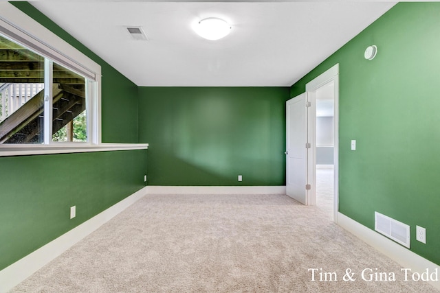 903 S Center Park Dr SW Unit 14, Byron Center, MI 49315 - carpeted spare room featuring baseboards