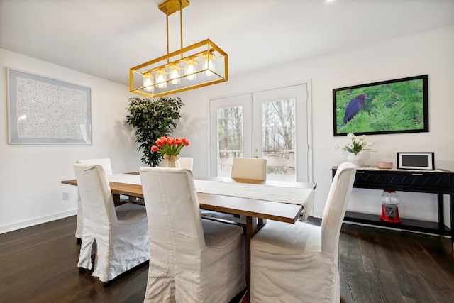 4396 Laurel Dr, Saint Joseph, MI 49085 - dining space with dark wood-type flooring, a chandelier, baseboards, and french doors