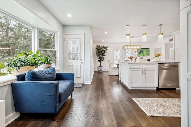 4396 Laurel Dr, Saint Joseph, MI 49085 - kitchen with dishwasher, plenty of natural light, white cabinets, and recessed lighting