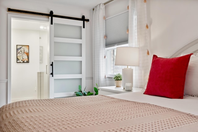 4396 Laurel Dr, Saint Joseph, MI 49085 - bedroom featuring a barn door
