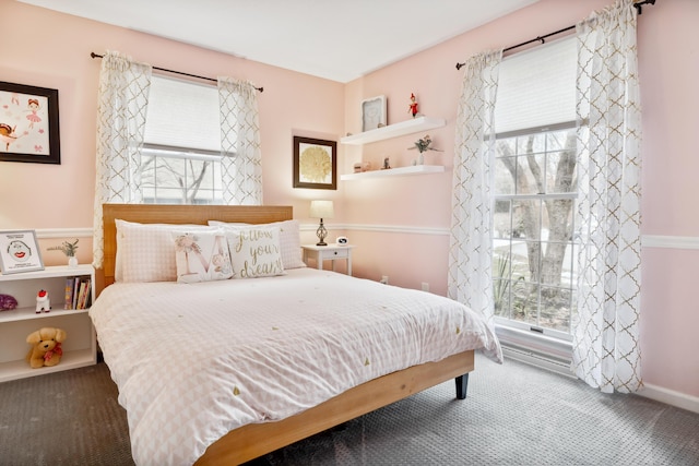 4396 Laurel Dr, Saint Joseph, MI 49085 - carpeted bedroom featuring multiple windows and baseboards