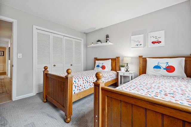 4396 Laurel Dr, Saint Joseph, MI 49085 - bedroom with light carpet, a closet, and baseboards