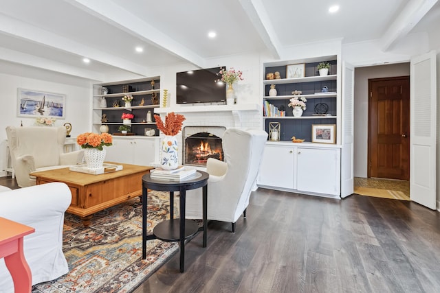 4396 Laurel Dr, Saint Joseph, MI 49085 - living room featuring beamed ceiling, dark wood finished floors, a brick fireplace, recessed lighting, and built in features