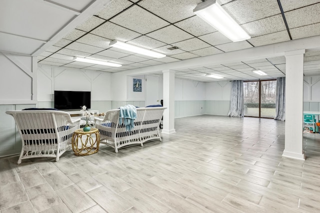 4396 Laurel Dr, Saint Joseph, MI 49085 - office space with wood finished floors, a drop ceiling, and wainscoting