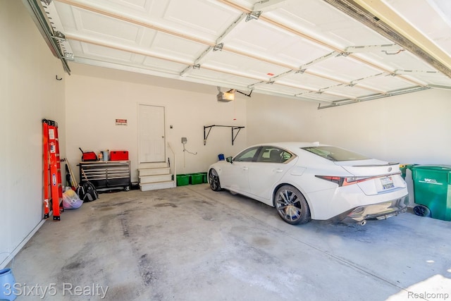 32879 Birchwood Dr, Chesterfield, MI 48047 - garage with a garage door opener