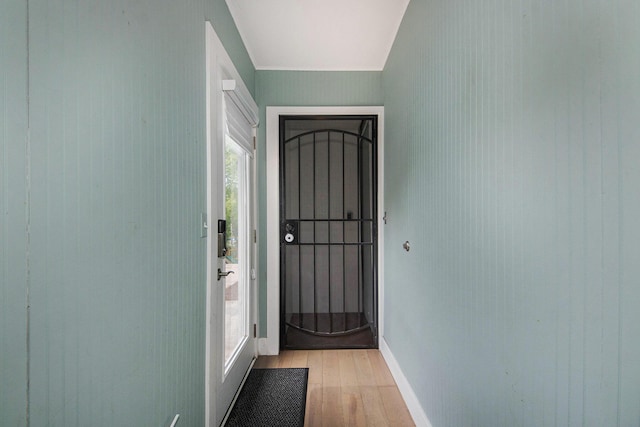 1710 Kreft St NE, Grand Rapids, MI 49525 - doorway with light wood-style flooring and baseboards